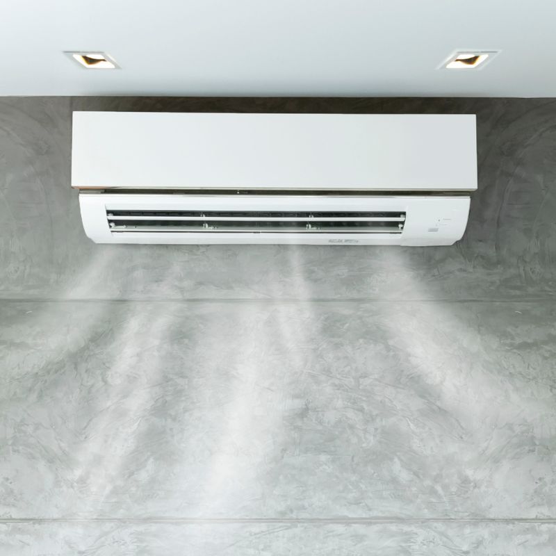 wall mounted air conditioner unit delivering cool air