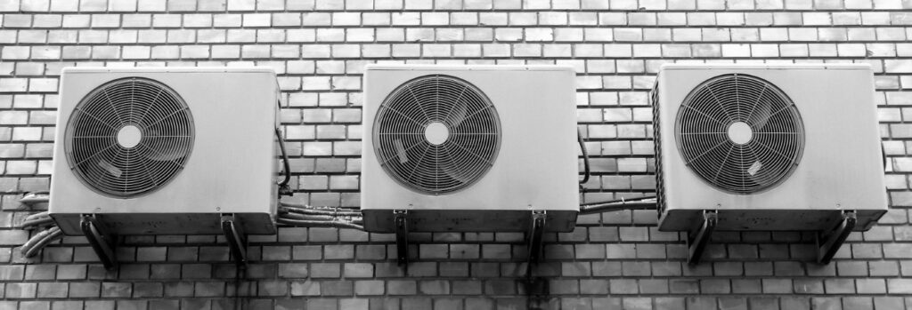 three outdoor air con units