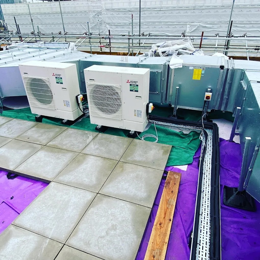 mitsubishi outdoor air conditioner units on roof