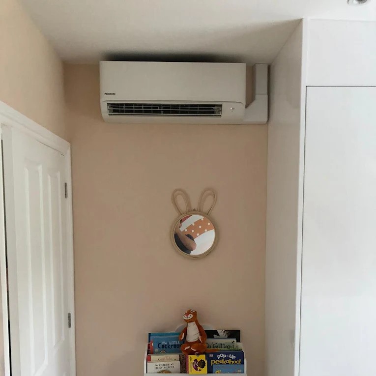 residential wall mounted air conditioner installed in a nursery