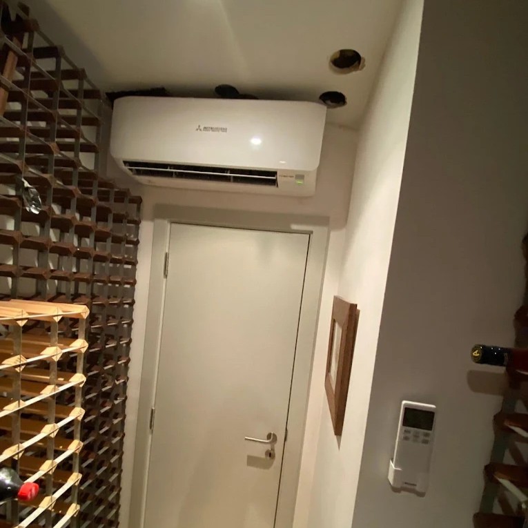 wall mounted air conditioner unit above door